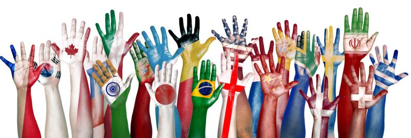 Group of Diverse Flag Painted Hands Raised