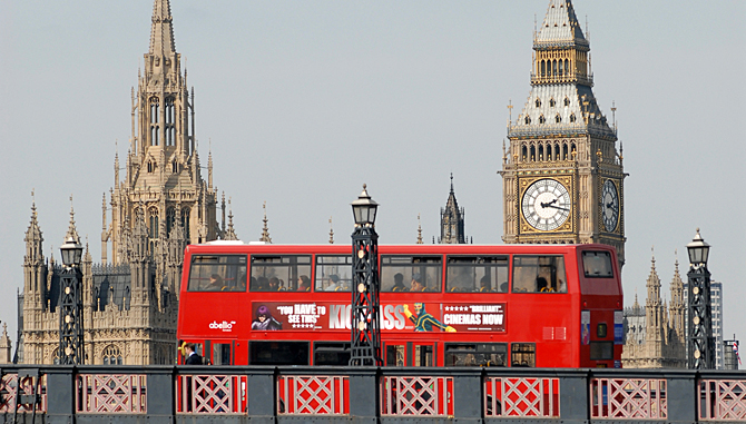 A double decker bus crosses Lambeth bridge