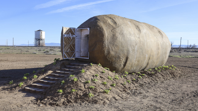 The Big Idaho® Potato Hotel, a 6-ton, 28-foot long, 12-foot wide and 11.5-foot tall spud made of steel, plaster and concrete, is firmly planted in an expansive field in South Boise, Idaho with breathtaking views of the Owyhee Mountains on Monday, April 22, 2019. The replica Russet Burbank potato traversed the U.S. from 2012 to 2018 aboard the Idaho Potato Commission’s Great Big Idaho Potato Truck until it was ultimately recycled into a unique retreat that can now be reserved on Airbnb. (Otto Kitsinger/AP Images for Idaho Potato Commission)