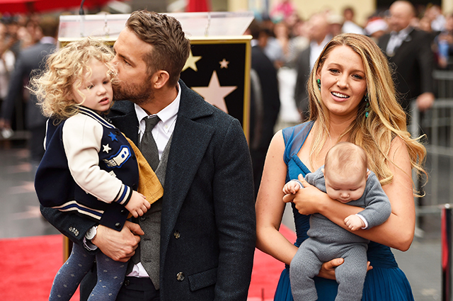 HOLLYWOOD, CA - DECEMBER 15:  Actors Ryan Reynolds (L) and Blake Lively pose with their daughters as Ryan Reynolds is honored with star on the Hollywood Walk of Fame on December 15, 2016 in Hollywood, California.  (Photo by Matt Winkelmeyer/Getty Images)