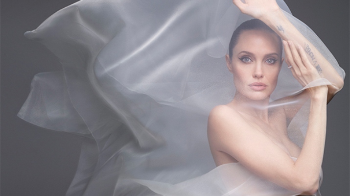 angelina-jolie-poses-nude-on-cover-of-harpers-bazaar-draped-only-in-white-wedding-esque-veil