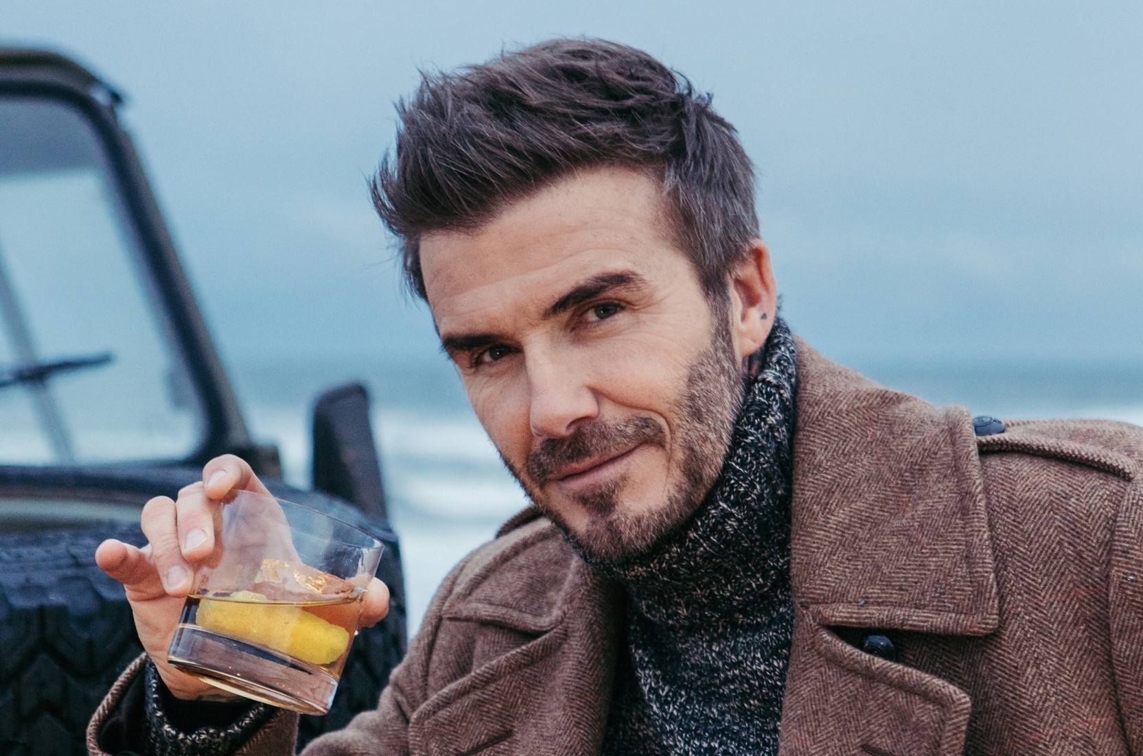 David-Beckham-raising-a-glass-of-scotch-at-the-HAIG-CLUB-Beach-Party-28th-October-2019 (3)