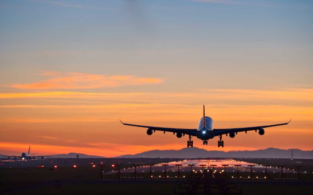Airbus A340 landing at dusk at Vancouver international airport.