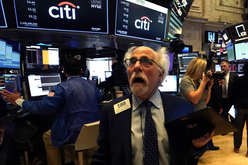 Peter Tuchman reacts as he works the floor during the opening bell at the New York Stock Exchange on March 9. TIMOTHY A. CLARY/AFP via Getty Images