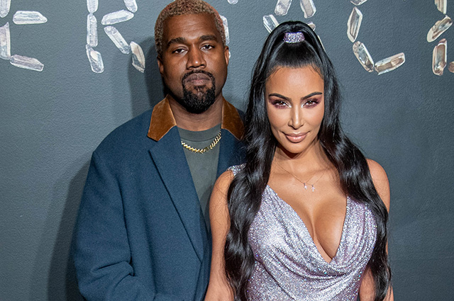 NEW YORK, NEW YORK - DECEMBER 02: Kanye West and Kim Kardashian West attend the the Versace fall 2019 fashion show at the American Stock Exchange Building in lower Manhattan on December 02, 2018 in New York City. (Photo by Roy Rochlin/Getty Images)