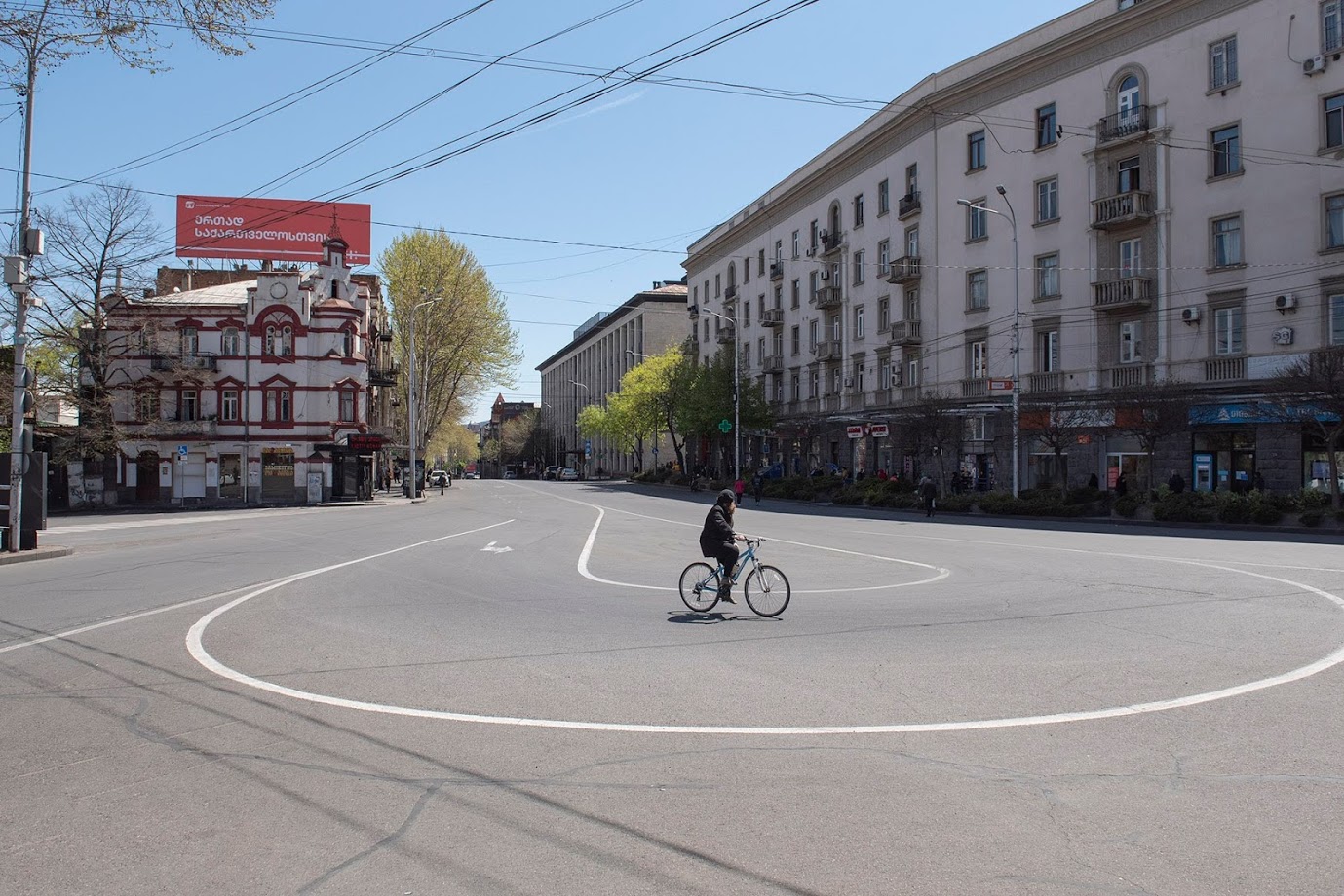 girl-cycling-Tbilisi-concert-hall-lockdown-17-04-20