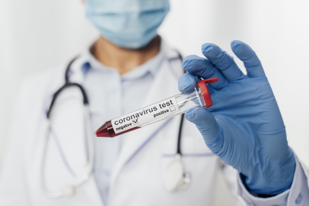 close-up-doctor-holding-coronavirus-test-23-2148767273