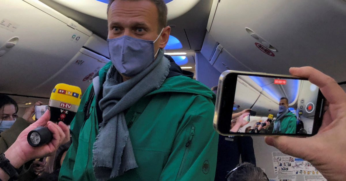 Russian opposition leader Alexei Navalny is seen on board a plane before the departure for the Russian capital Moscow at an airport in Berlin, Germany January 17, 2021. REUTERS/Polina Ivanova