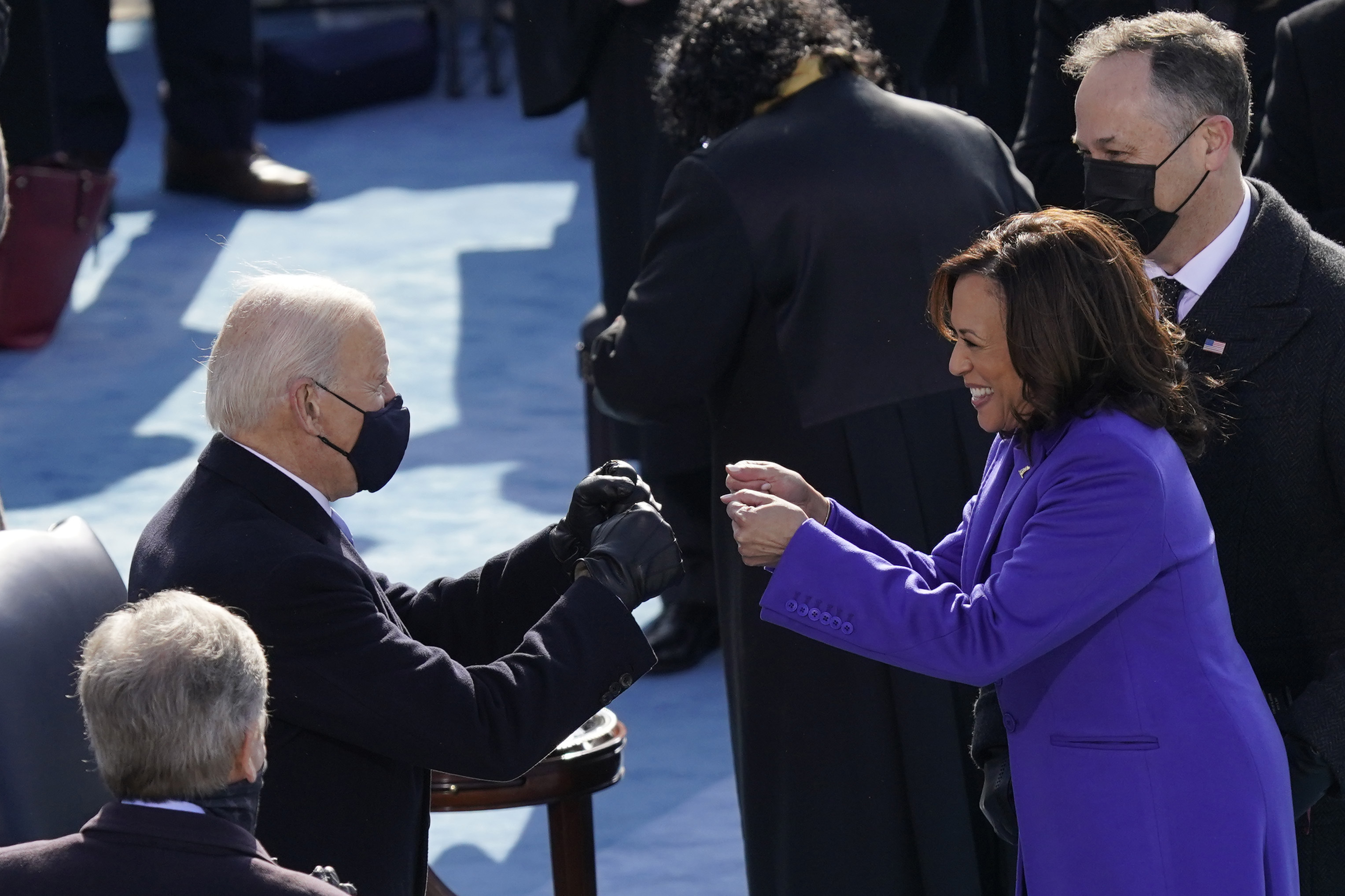 President-elect Joe Biden congratulates Vice President Kamala Harris after she was sworn in during the 59th Presidential Inauguration at the U.S. Capitol in Washington, Wednesday, Jan. 20, 2021. (AP Photo/Carolyn Kaster)