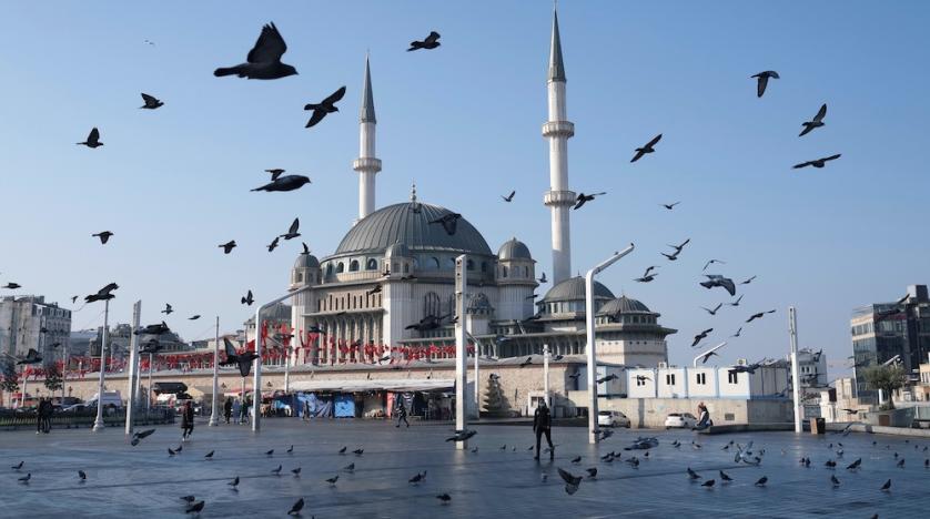 pigeons-fly-over-the-taksim-square-during-a-nation-wide-weekend-curfew-which-was-imposed-to-prevent-the-spread-of-the-coronavirus-disease-in-istanbul-turkey-december-5-2020.-reuters