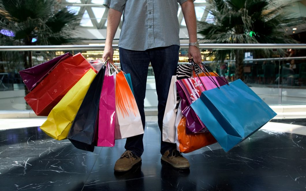 man-colourful-shopping-bags