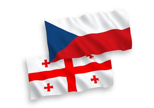 National vector fabric wave flags of Czech Republic and Georgia isolated on white background. 1 to 2 proportion.
