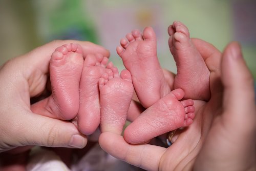 1617549507-triplets-babies-stock-getty