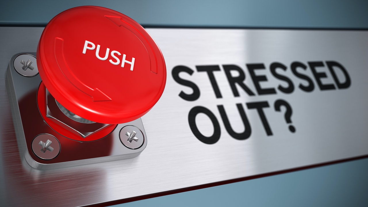 Stressed out text with urgency push button with blur effect, Concept for stress management.
