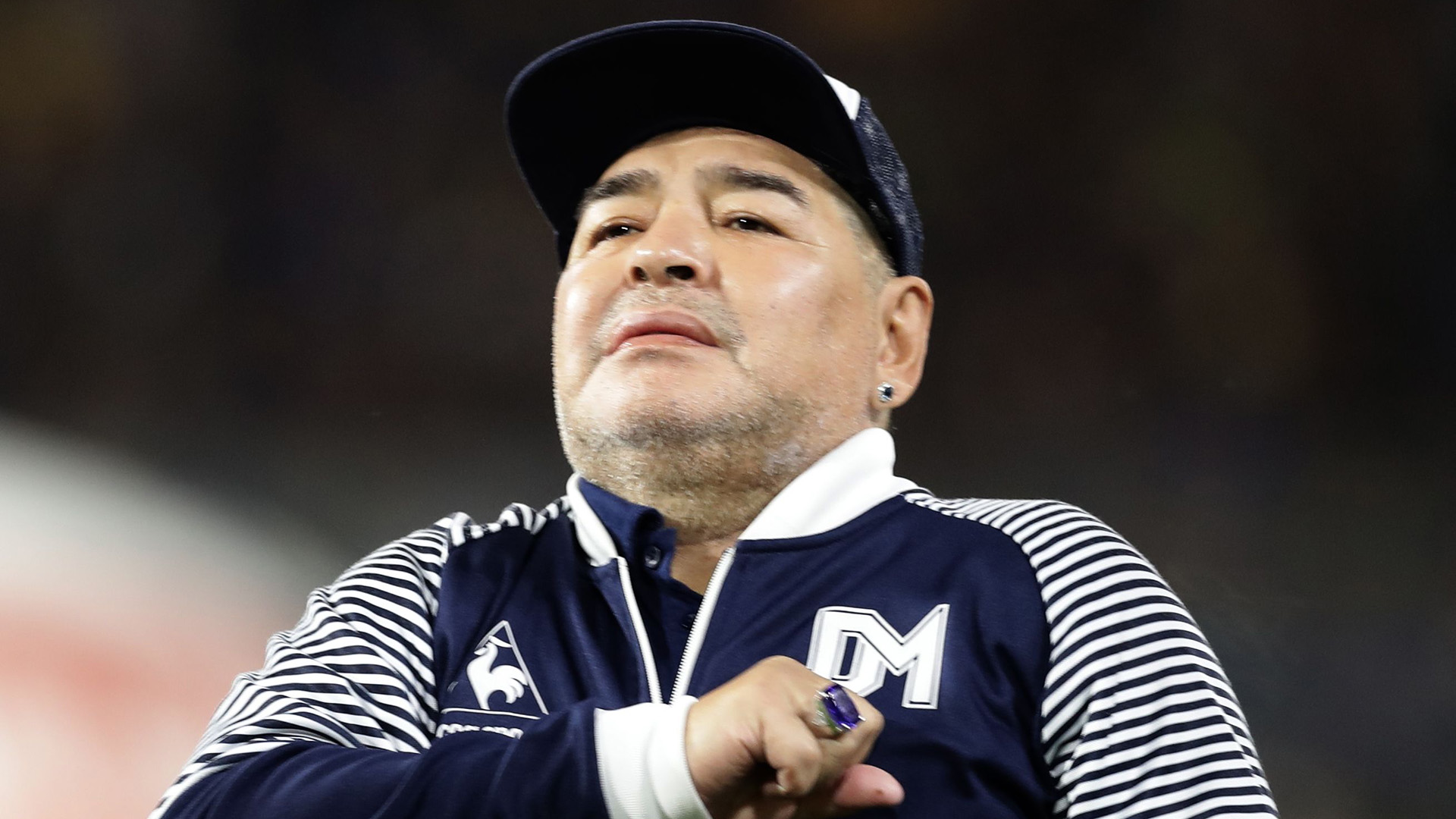 Argentine former football star Diego Maradona acknowledges spectators during an homage before the start of the Argentina First Division 2020 Superliga Tournament football match Boca Juniors vs Gimnasia La Plata, at La Bombonera stadium, in Buenos Aires, on March 7, 2020. (Photo by ALEJANDRO PAGNI / AFP) (Photo by ALEJANDRO PAGNI/AFP via Getty Images)