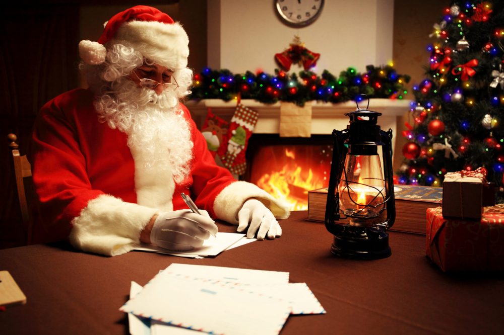 Portrait of Santa Claus answering Christmas letters