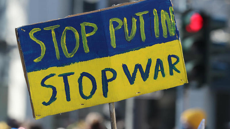 epa09791566 A sign reading 'Stop Putin. Stop War' during a peace rally on Rose Monday in Cologne, Germany, 28 February 2022. Due to the ongoing war in Ukraine, an originally planned Rose Monday parade at the Rheinenergiestadion stadium was canceled. Instead, thousands of participants are expected to take part in a peace demonstration in the inner city of Cologne.  EPA-EFE/FOCKE STRANGMANN