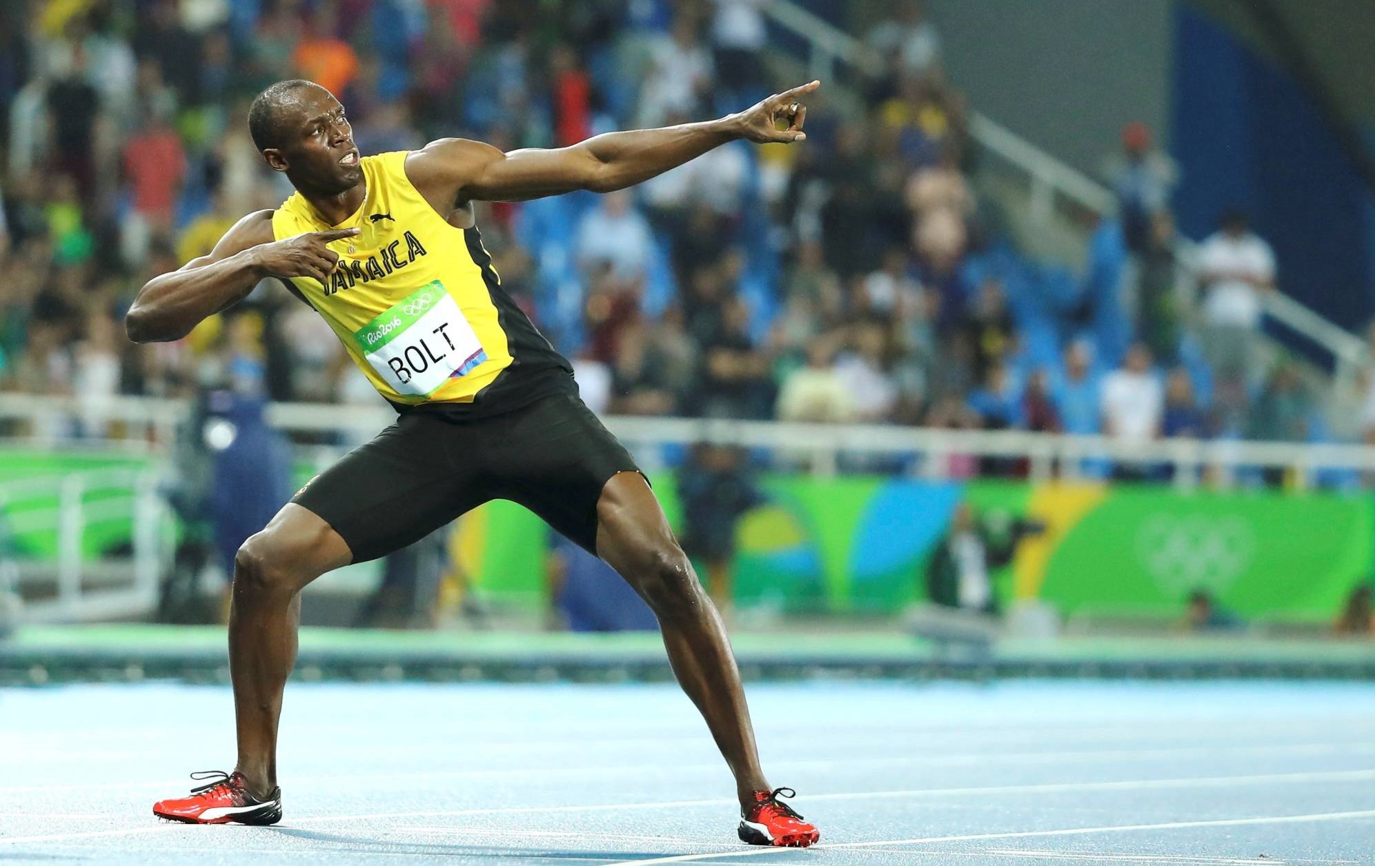 FILE PHOTO: 2016 Rio Olympics - Athletics - Final - Men's 200m Final - Olympic Stadium - Rio de Janeiro, Brazil - 18/08/2016. Usain Bolt (JAM) of Jamaica poses after winning the gold.   REUTERS/Lucy Nicholson  FOR EDITORIAL USE ONLY. NOT FOR SALE FOR MARKETING OR ADVERTISING CAMPAIGNS./File Photo