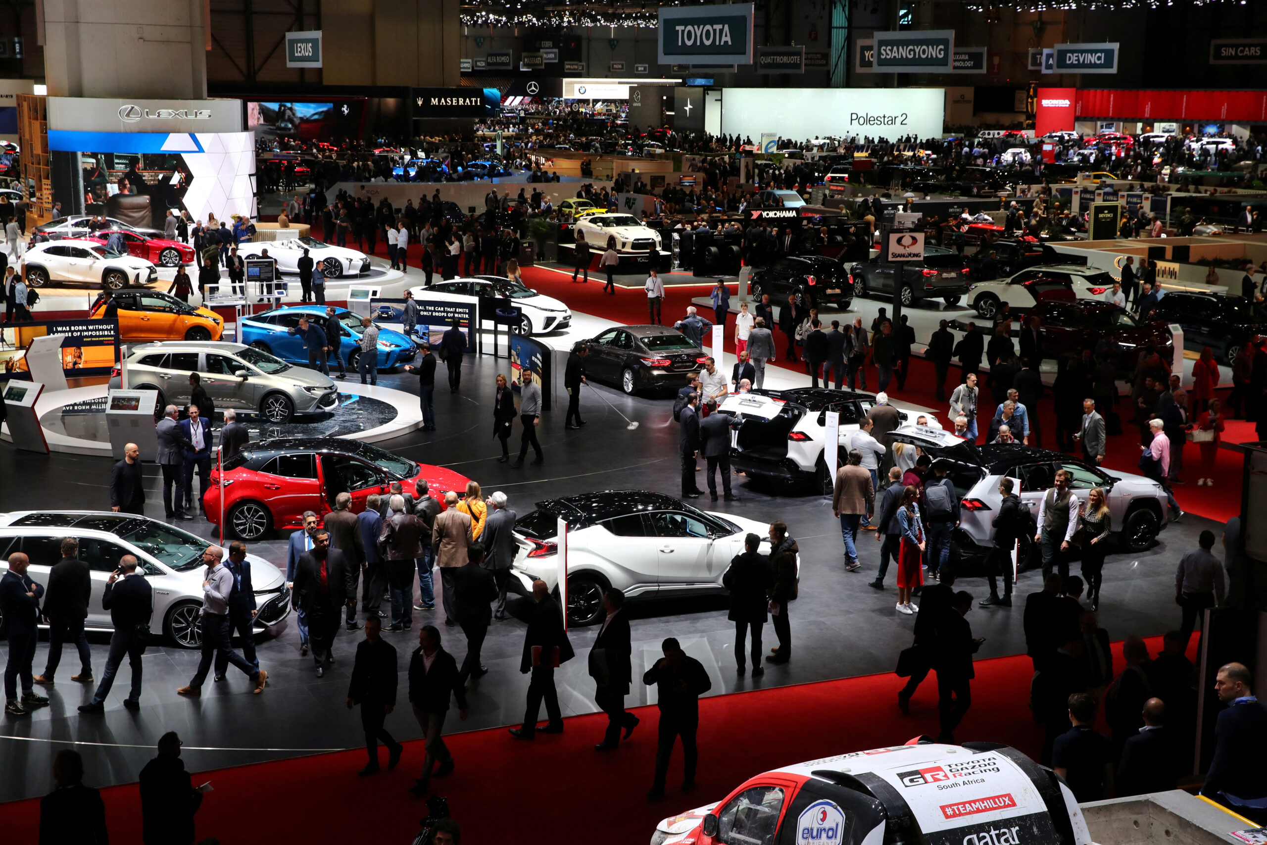 FILE PHOTO: Visitors are pictured at the 89th Geneva International Motor Show in Geneva, Switzerland March 6, 2019. REUTERS/Denis Balibouse